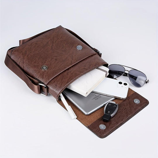 Bolso bandolera vertical de cuero Arvid