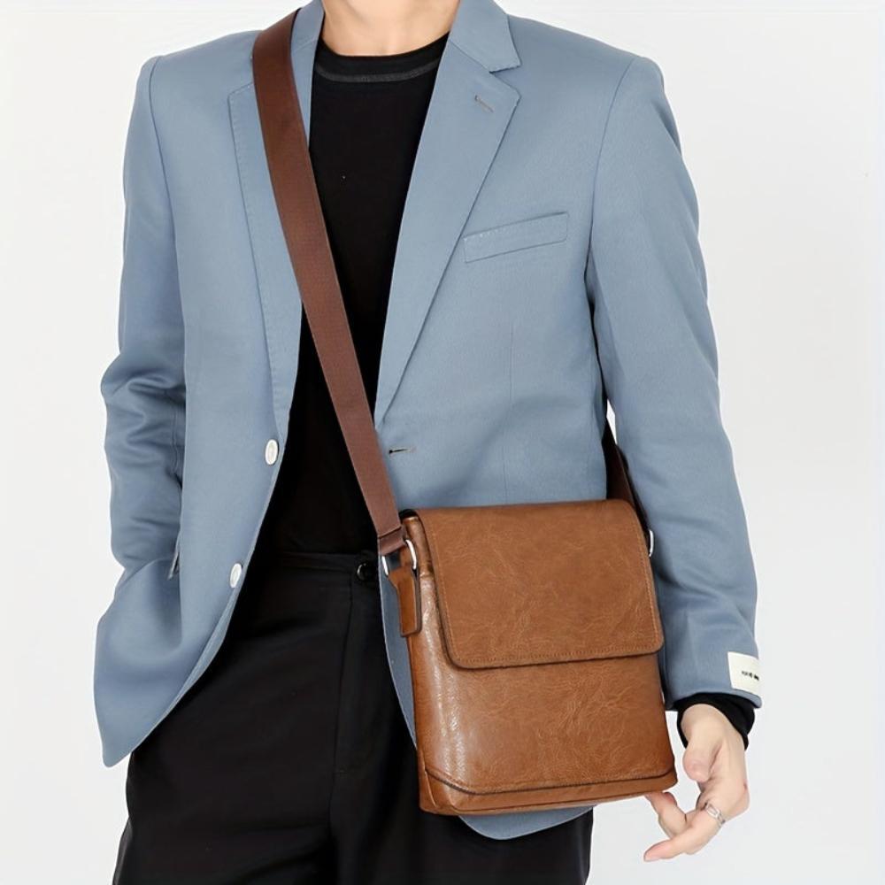 Bolso bandolera vertical de cuero Arvid