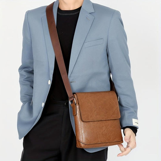 Bolso bandolera vertical de cuero Arvid