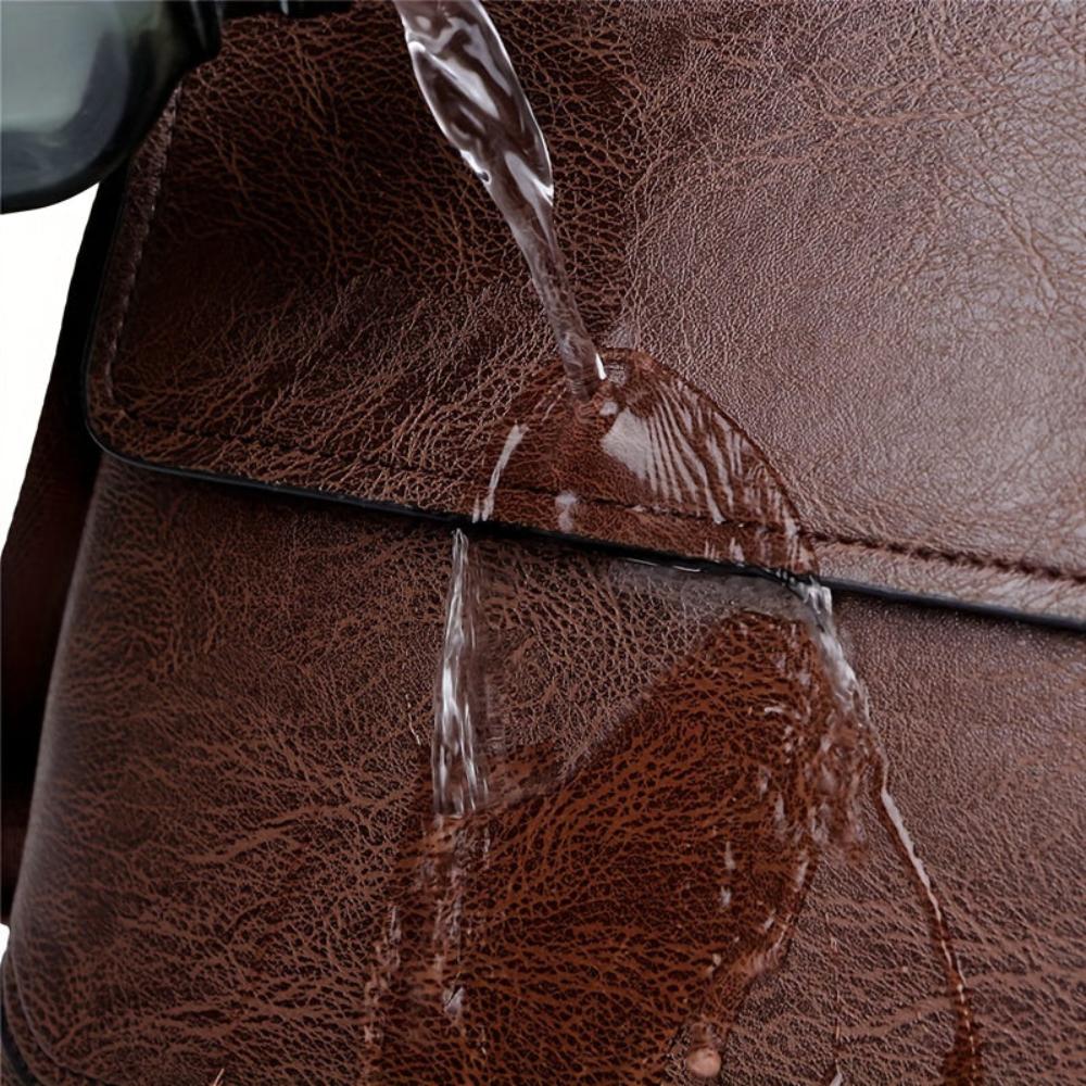 Bolso bandolera vertical de cuero Arvid