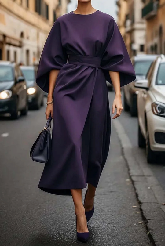 Sofía - elegante vestido con mangas abullonadas y cinturón.