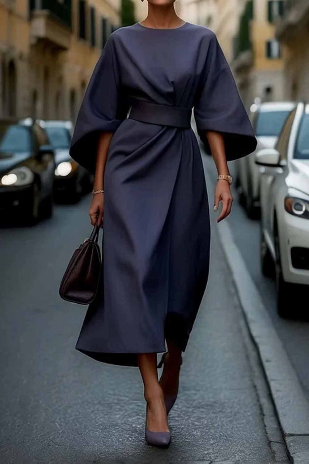 Sofía - elegante vestido con mangas abullonadas y cinturón.