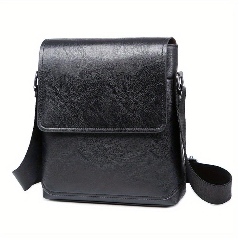 Bolso bandolera vertical de cuero Arvid